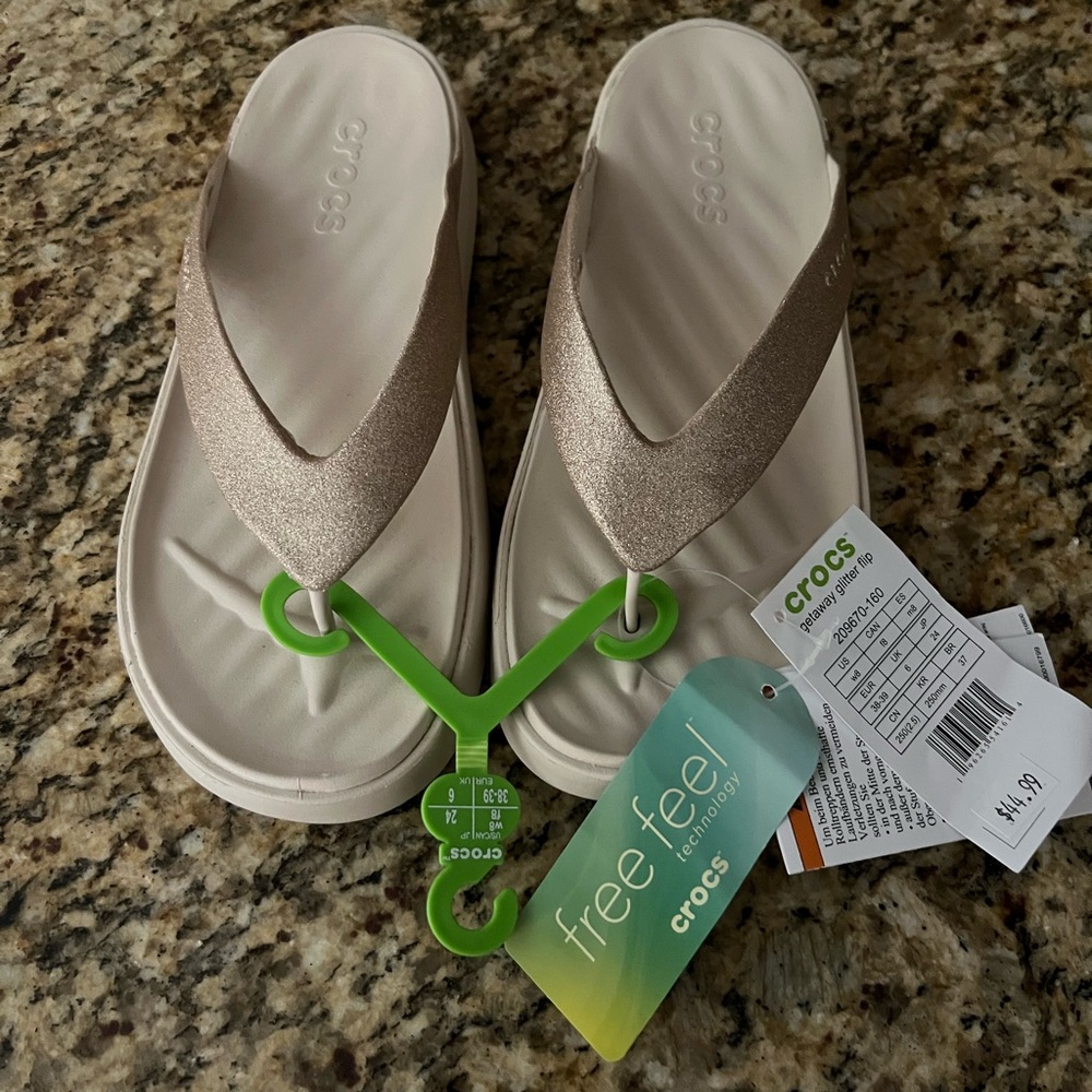 CROCS Glitter Flip Flops in Gold